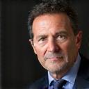 Professional headshot of Jean-Pierre Dubois